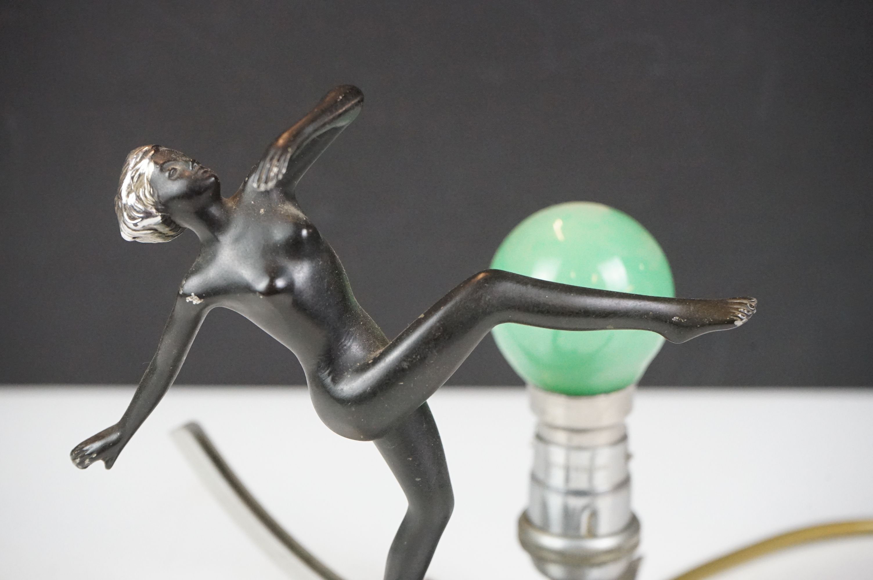 Art Deco wall lamp having a star shaped back plate with a nude female figure and green light bulb. - Image 2 of 9