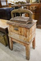 Victorian Cast Iron Book Press with central screw thread, fitted on a rustic pine stand with