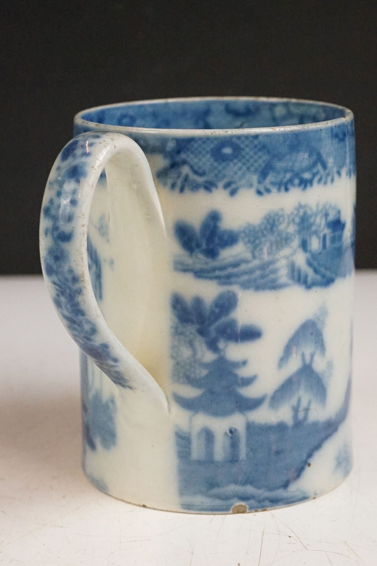 Four 19th century blue & white printed ceramic tankards, featuring early 19th century and Willow - Image 25 of 27