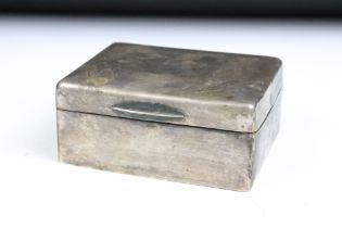 A fully hallmarked sterling silver cigarette box, assay marked for London and dated for 1930.