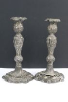 A pair of antique fully hallmarked sterling silver candlesticks, stand approx 24cm in height.