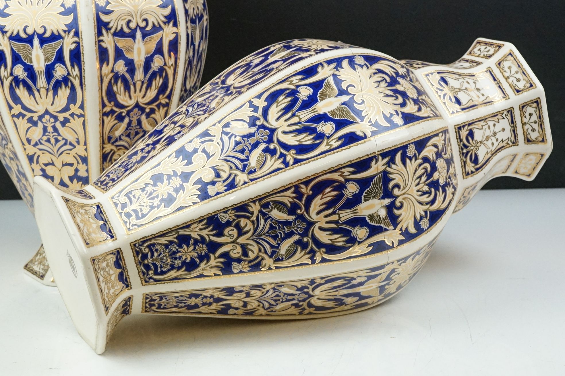 Set of four 20th Century ceramic vases of panelled octagonal design, each each having blue and - Image 8 of 16