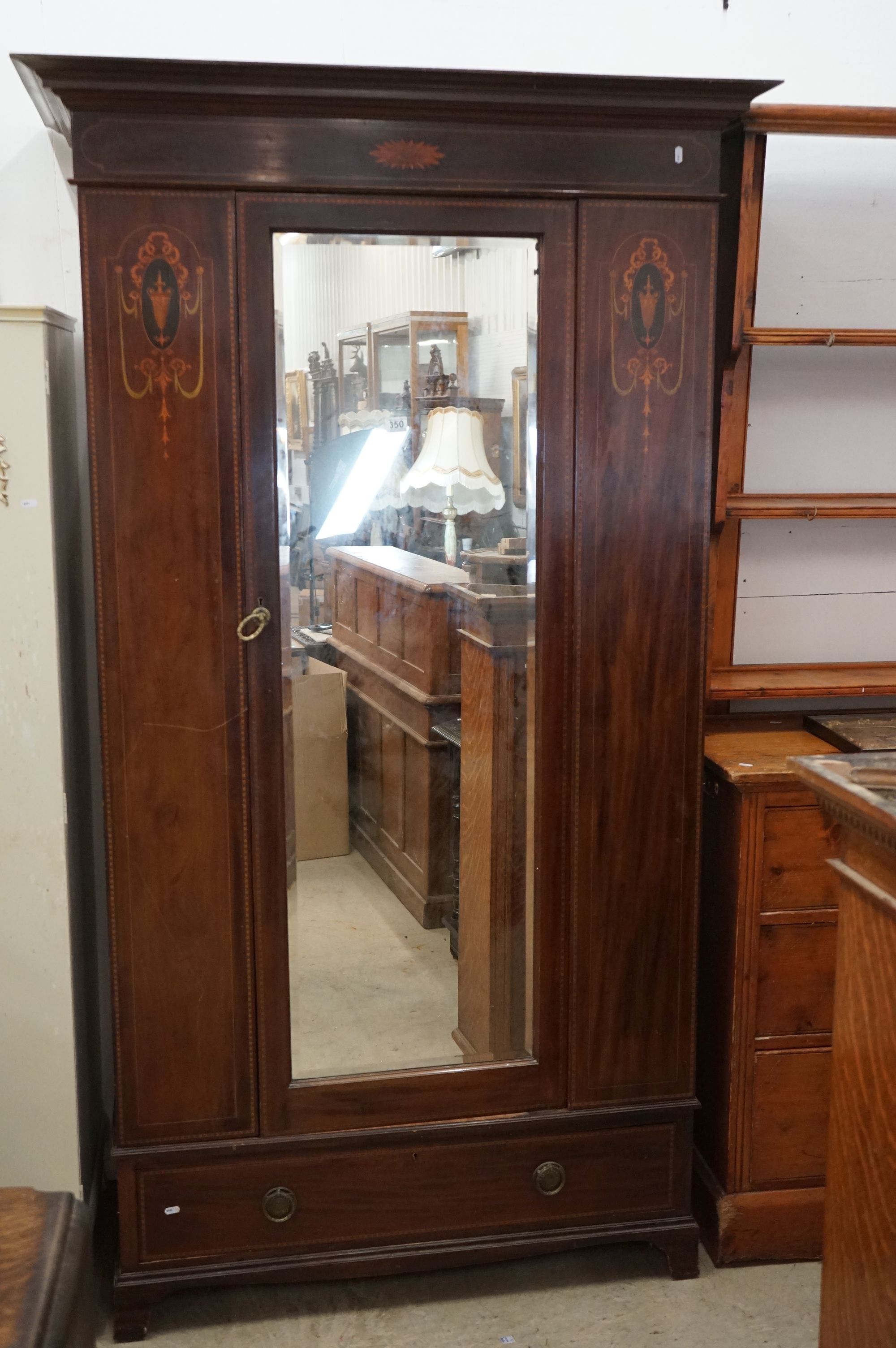 Edwardian Mahogany Inlaid Wardrobe, the single mirrored door opening to a hanging space above a long