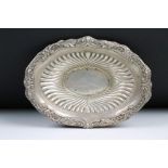 A fully hallmarked sterling silver dish with traditional decoration, assay marked for Sheffield