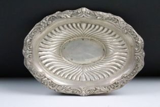 A fully hallmarked sterling silver dish with traditional decoration, assay marked for Sheffield