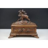 Late 19th Century Victorian Black Forest carved wooden box having a carved goat to the lid, with