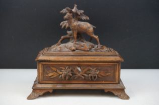 Late 19th Century Victorian Black Forest carved wooden box having a carved goat to the lid, with