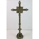 Large 19th century cast brass floor standing crucifix, with barley twist style design to base of