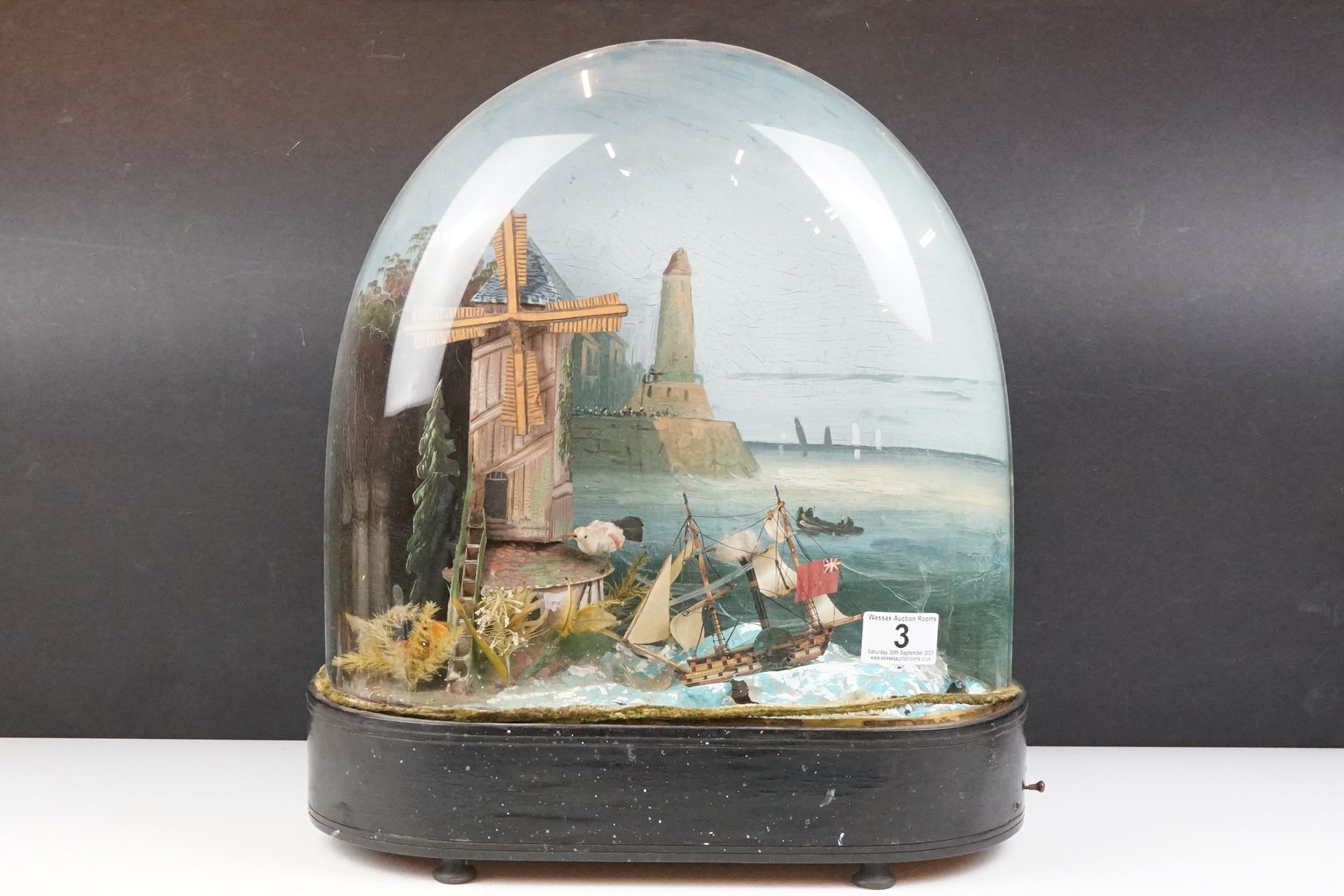 19th Century Victorian diorama automaton featuring a sea side scene including a model boat and