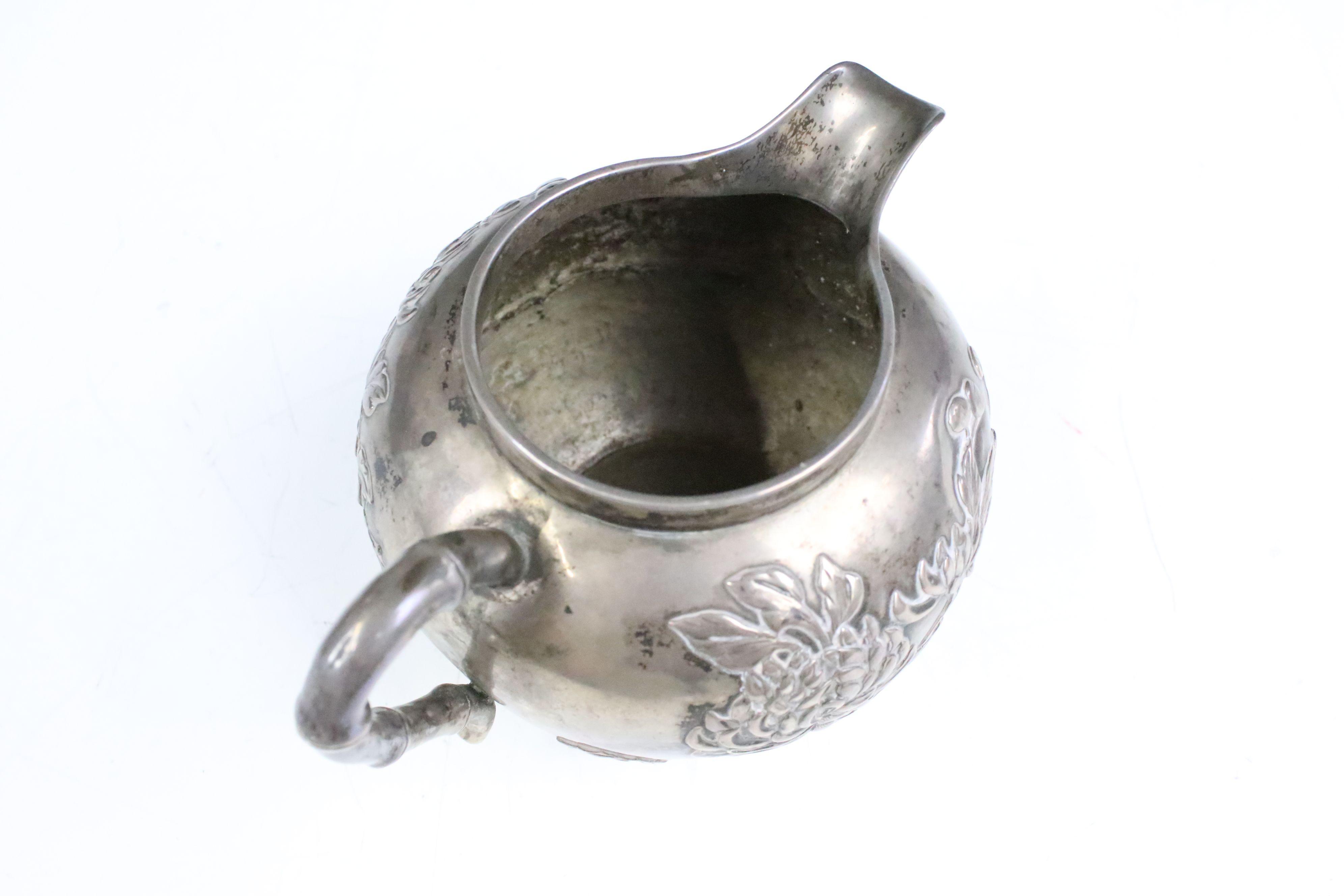 An antique Chinese silver teapot cast with cherry blossom decoration and bamboo style handles and - Image 7 of 8