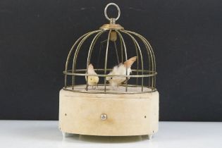 Mid 20th Century automaton musical jewellery box in the form of a bird cage having an upholstered