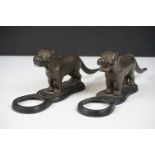 Pair of early 20th Century cast iron nut crackers in the from of dogs with mechanical tails and