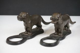 Pair of early 20th Century cast iron nut crackers in the from of dogs with mechanical tails and