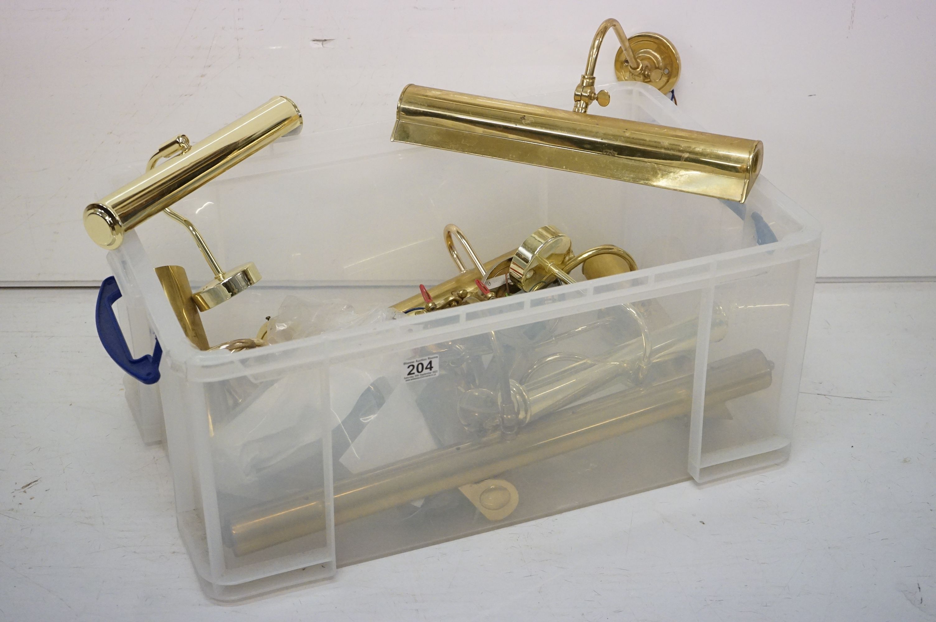 A collection of eleven brass picture lights, to include: two pairs and a set of three matching