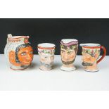Four 19th Century Staffordshire satyr jugs, three featuring Bacchus together with another having a