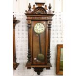 Late 19th century walnut cased Vienna style wall clock, the enamel dial with Roman numerals and