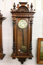 Late 19th century walnut cased Vienna style wall clock, the enamel dial with Roman numerals and