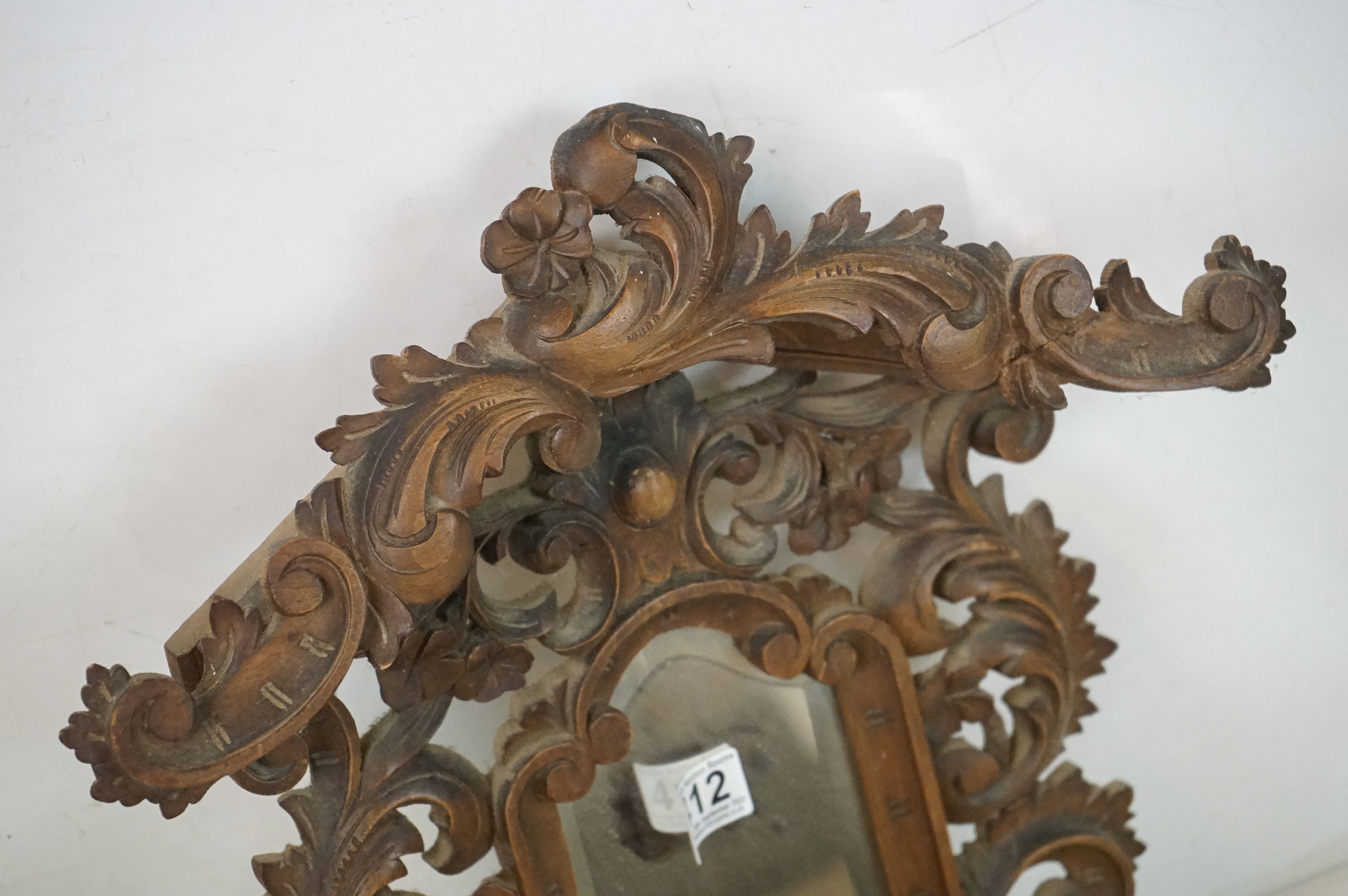 Black Forest Walnut Hanging Hall Mirror and folding Shelf, carved with foliate scrolls, 59cm high - Image 2 of 7