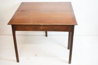 George III Mahogany Rectangular Fold-over Tea Table, raised on canted square supports, 91cm long x