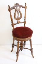 Victorian Walnut Aesthetic Movement Adjustable Harpist's or Cellist's Chair, with carved Lyre back