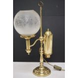 Brass table lamp, the globular shade of etched design, 57.5cm high