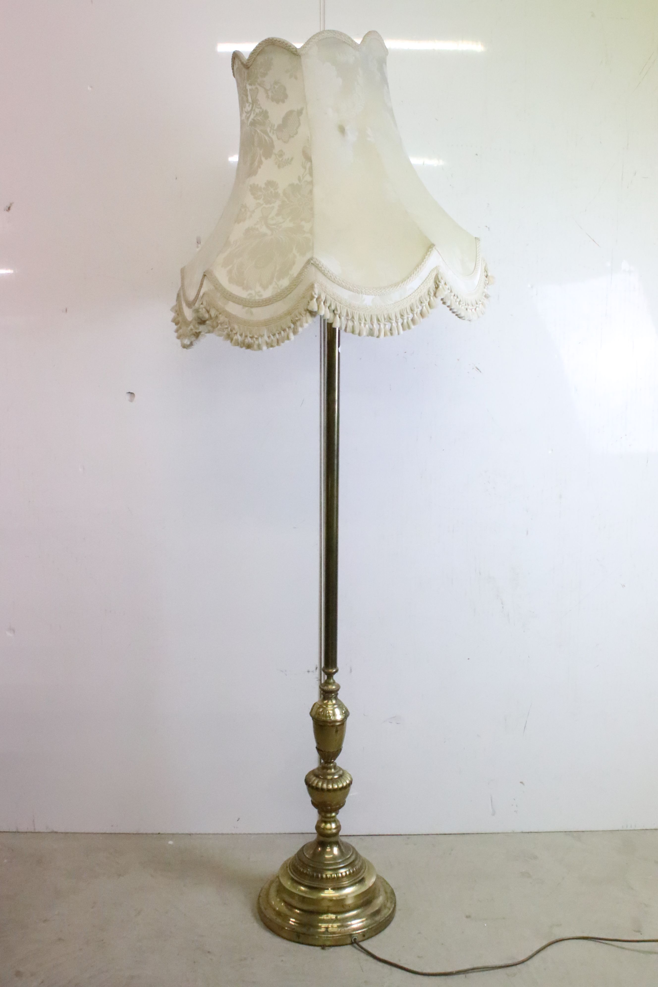Brass Standard Lamp raised on a stepped circular base, with shade, total height 188cm