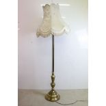 Brass Standard Lamp raised on a stepped circular base, with shade, total height 188cm