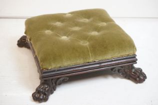 Victorian Rosewood Square Footstool with green button upholstered top and heavily carved lion paw