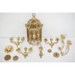 Seven contemporary brass wall lights to include a three-light example (approx 50cm high), a set of