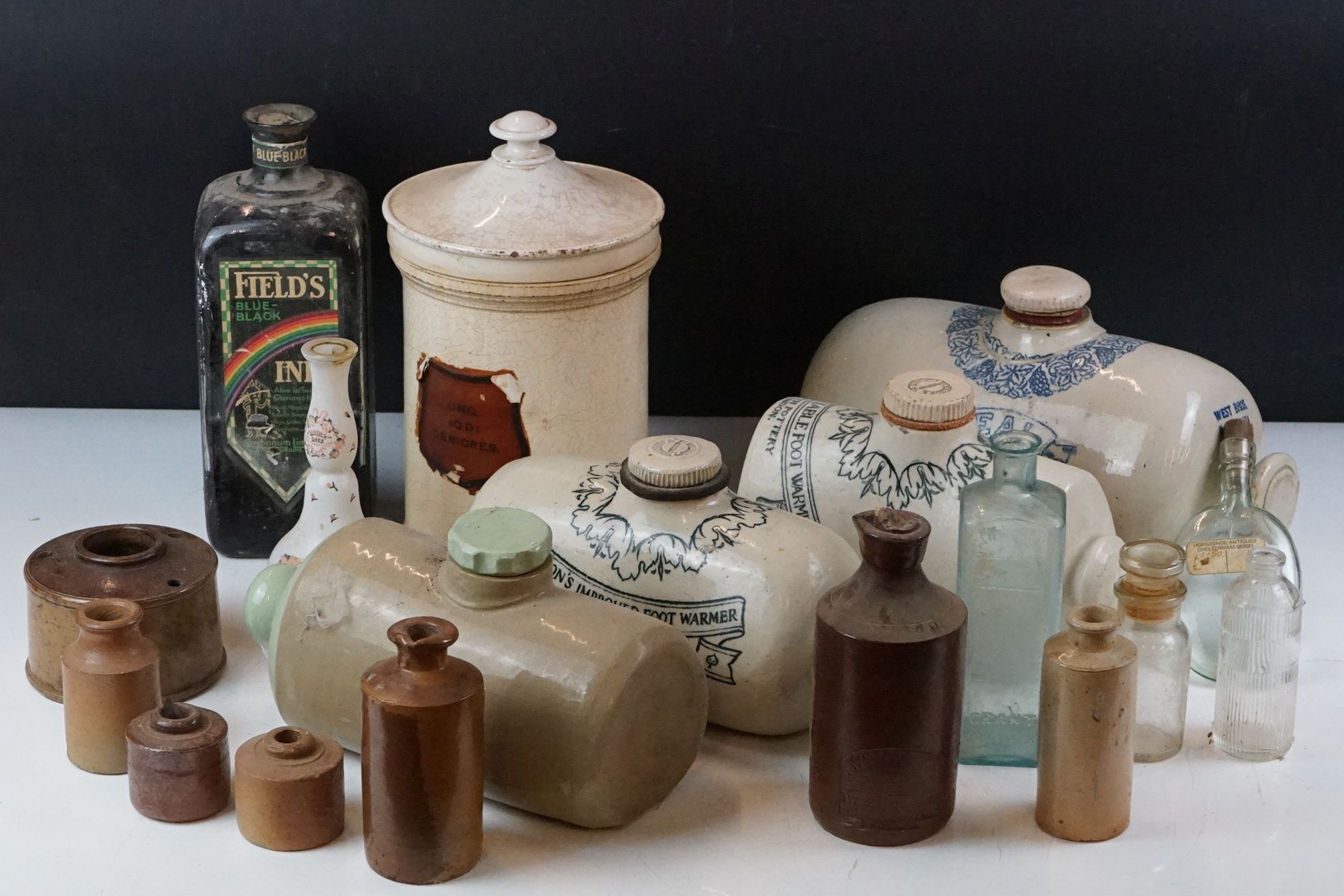 Collection of 19th Century stoneware to include stoneware footwarmers, a lidded apothecary jar,