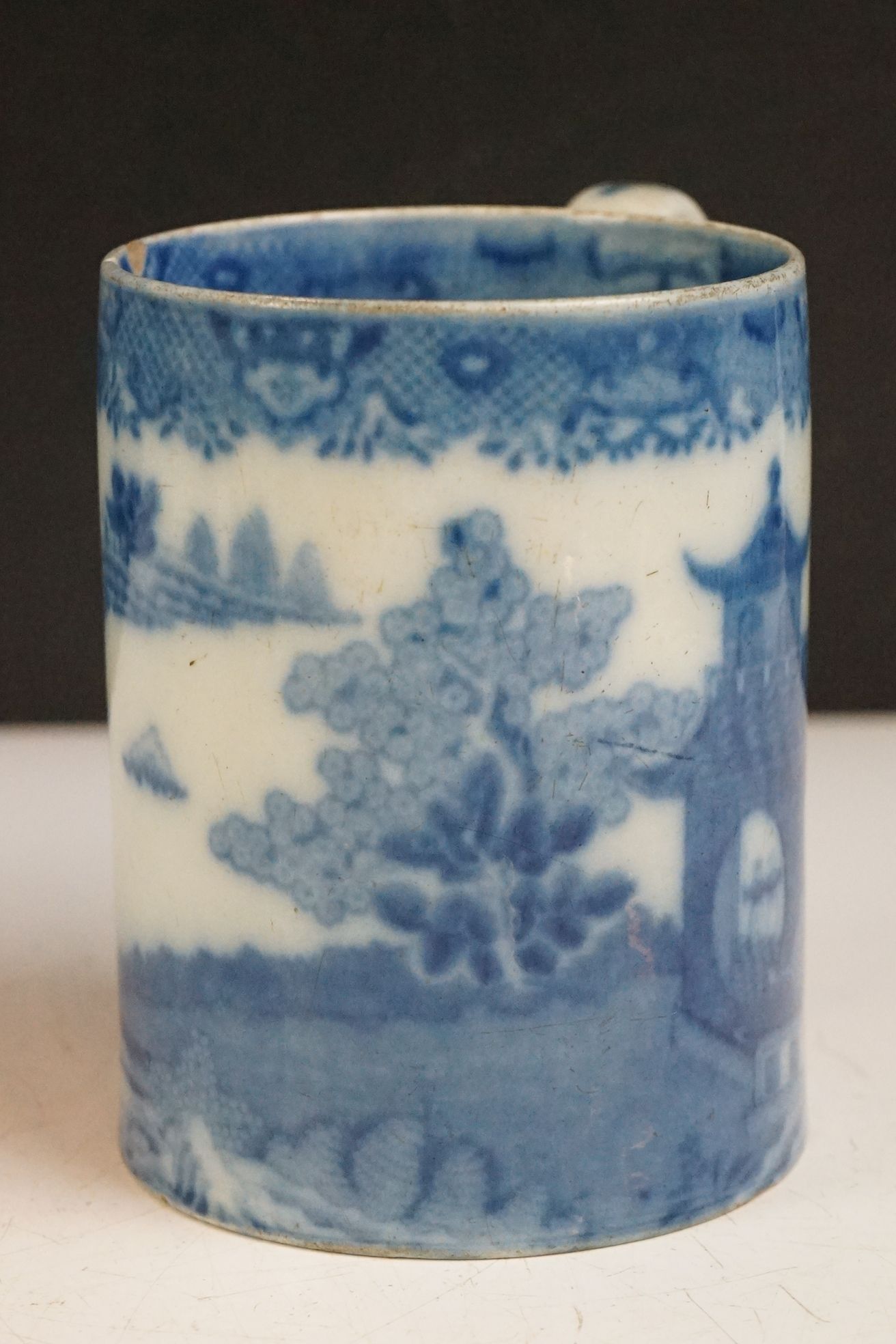 Four 19th century blue & white printed ceramic tankards, featuring early 19th century and Willow - Image 23 of 27