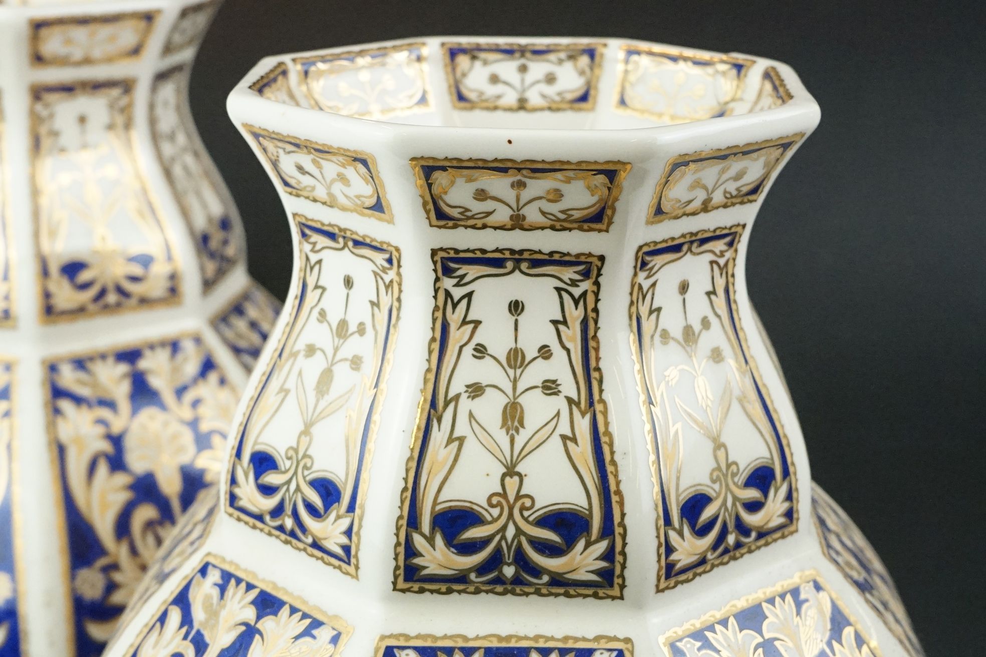 Set of four 20th Century ceramic vases of panelled octagonal design, each each having blue and - Image 6 of 16