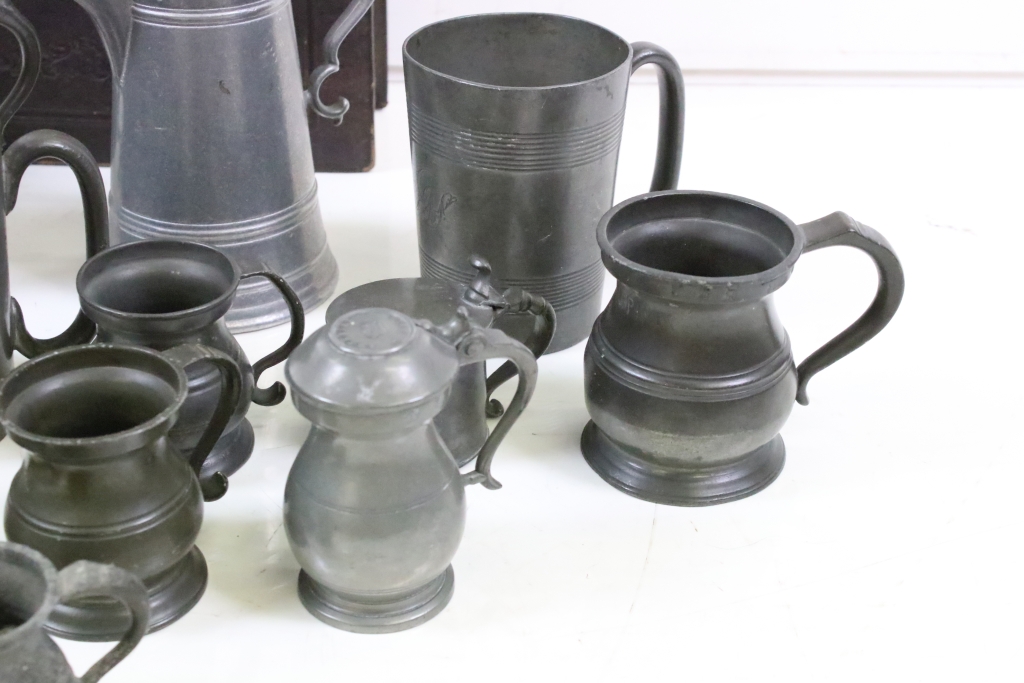 A collection of antique pewter to include tankards, jug, hip flask...etc. together with an antique - Image 2 of 7