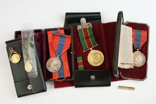 Two British full size imperial service medals to include a Queen Elizabeth II and a King George V