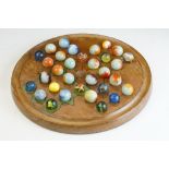 Mid century Wooden Solitaire Board and Coloured Marbles, 23cm diameter