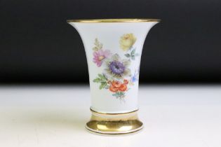 20th Century Meissen trumpet vase with hand painted floral decoration and gilt highlights, crossed