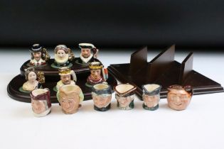 Set of Six Royal Doulton 'Kings & Queens of the Realm' tiny character jugs on wooden display