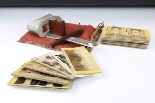 Early 20th century 'The Perfecscope' stereoscope viewer, together with a quantity of stereoscopic