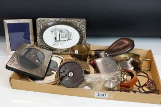 A box of mixed collectables to include hip flasks, powder flasks, wool cutter, photograph frames,