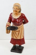 Composition Dumb Waiter in the form of an Old Waitress in a Red Dress, 94cm high