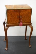 19th century Burr Walnut and Brass Bound Cutlery Cabinet, the two panel doors opening to three