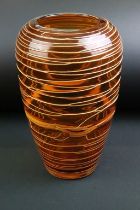 Amber studio art glass vase of tapering form, with spiralling 'thread' decoration, ground pontil