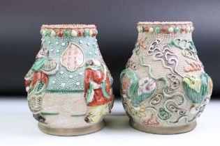 Two Chinese pottery vases of baluster form with polychrome enamel decoration, possibly offering