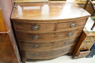 Early 19th century Mahogany Bow Front Chest of Two Short over Three Long Drawers raised on swept