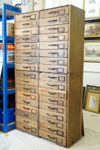 Pine Tall Chest of Thirty Four Drawers, formerly from a Hardware Shop, 92cm wide x 35cm deep x 167cm