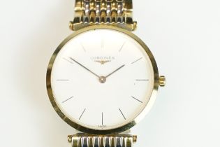 A gents Le Grande Classic De Longines with white enamel dial on original bi metal strap, longings