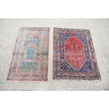 Two Persian Multi-coloured Ground Wool Rugs, 210cm x 121cm and 204cm x 138cm