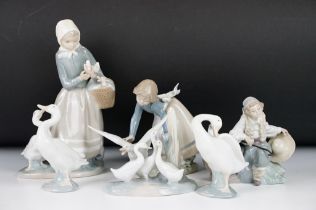 Five Lladro ceramic figurines to include three figurine groups with birds and a goose, together with