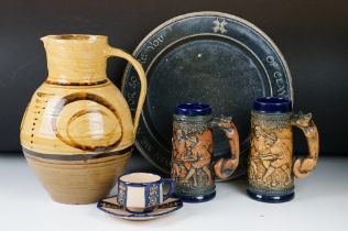 Group of ceramics to include Cricklade pottery jug, Quimper teacup and saucer two West German steins