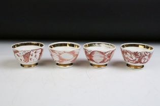 Set of four Fornasetti pottery tea bowls, each printed in sepia with food ingredients